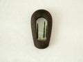 Front view of a slim black arched wood frame, featuring a minimalist silhouette and rich dark grain texture.