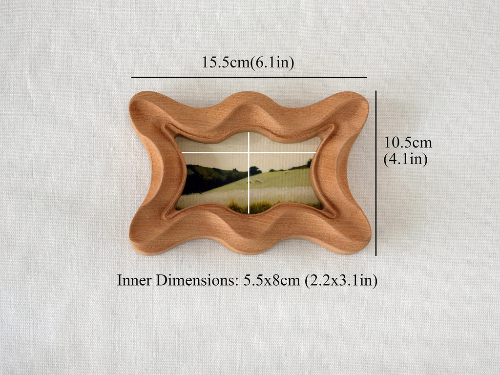 Dimensions for the wave frame: 15.5x10.5cm outer size, with a 5.5x8cm inner window for landscape artwork.