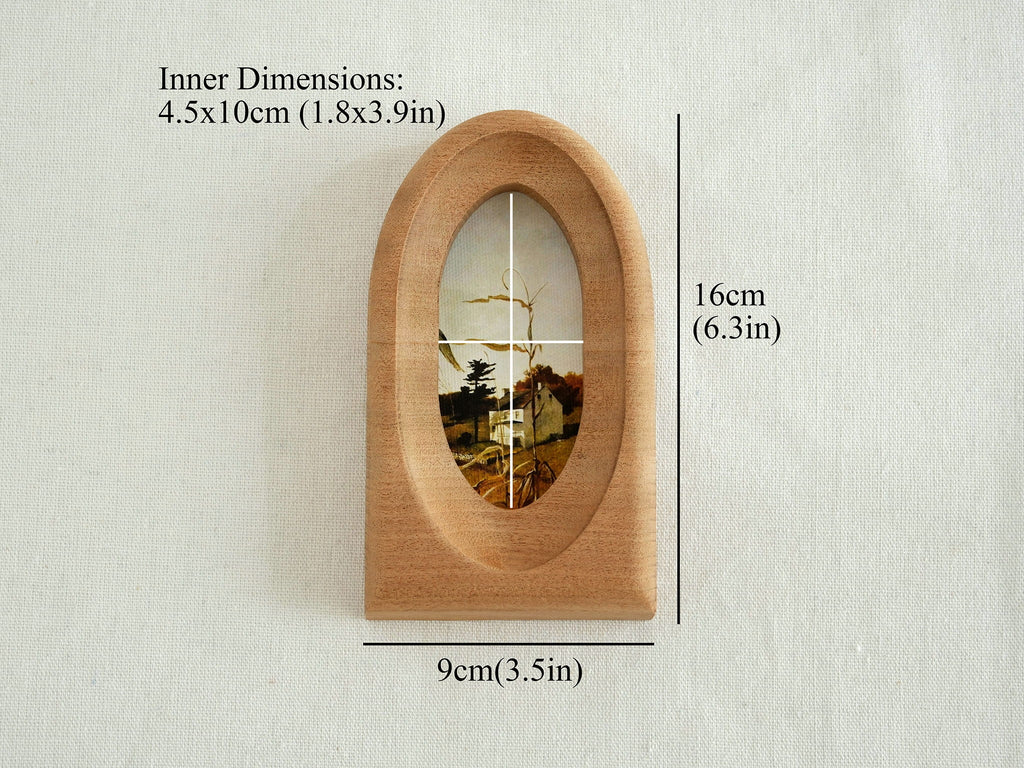 Dimensions for arched frame: 16x9cm outer size, with a 4.5x10cm inner window for vertical artwork.