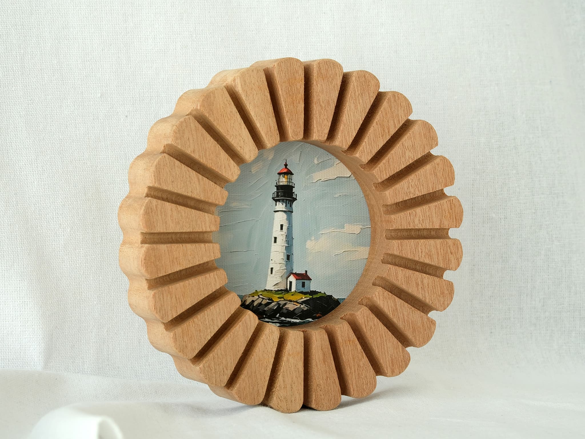 The handcrafted sunflower circular solid wood frame standing on a white surface, showcasing its sunburst edge and lighthouse art.