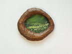 Large walnut wood wall art picture frame with green landscape artwork, front view.