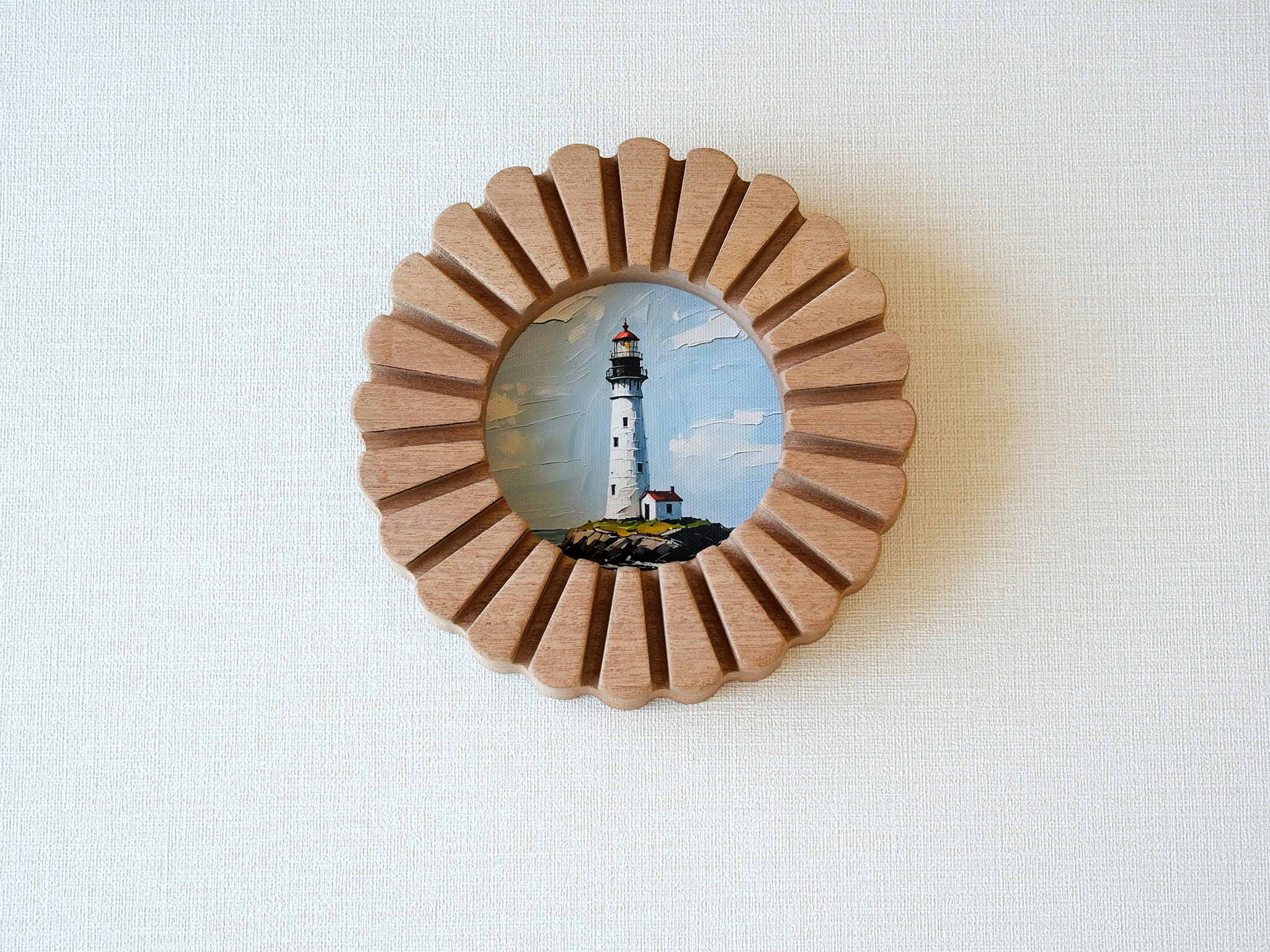 Front view of the sunflower circular solid wood frame with a lighthouse art print, featuring a grooved sunburst design.