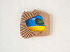 Handmade solid wood wall art picture frame with accordion-inspired shape and landscape artwork, front view.