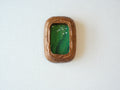 Front view of the Rounded Rectangle handmade solid wood art frame in a vertical orientation, featuring a painting of white birds flying over a dense green forest.