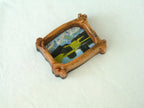 A top-down perspective of the organic wood frame, highlighting its unique branch-shaped silhouette and natural wood grain.