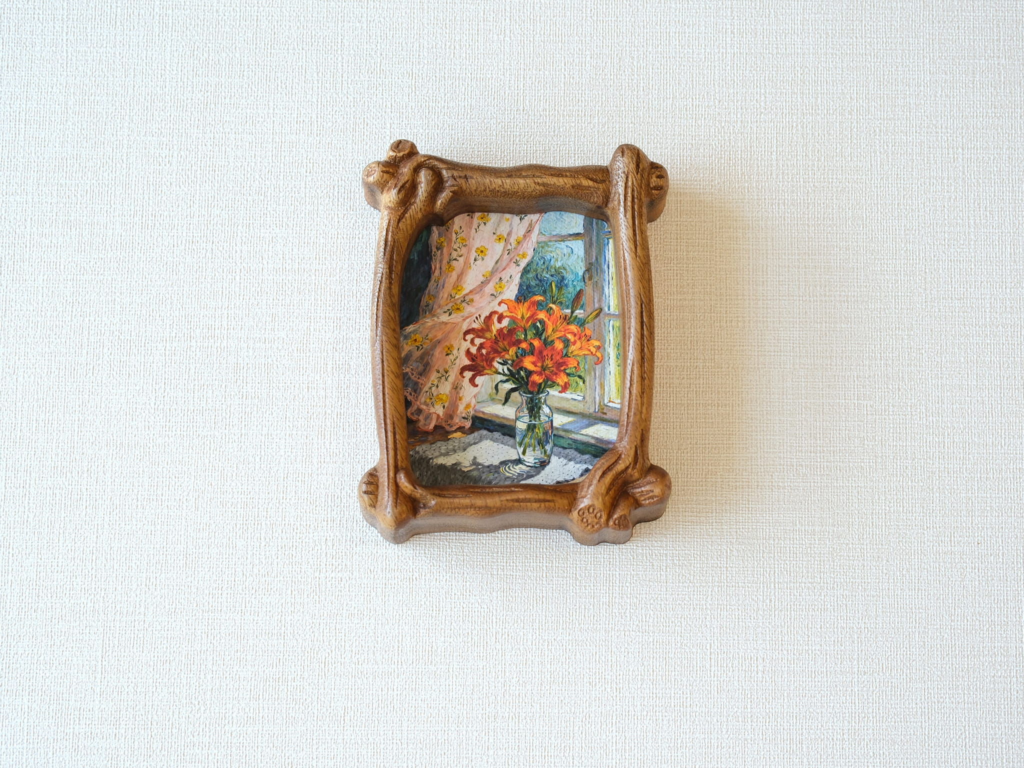 Front view of the handcrafted wood frame, showcasing its organic branch design and the floral art print, on a white canvas background.