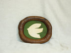 Large walnut wood wall art picture frame with dove artwork, leaning display.