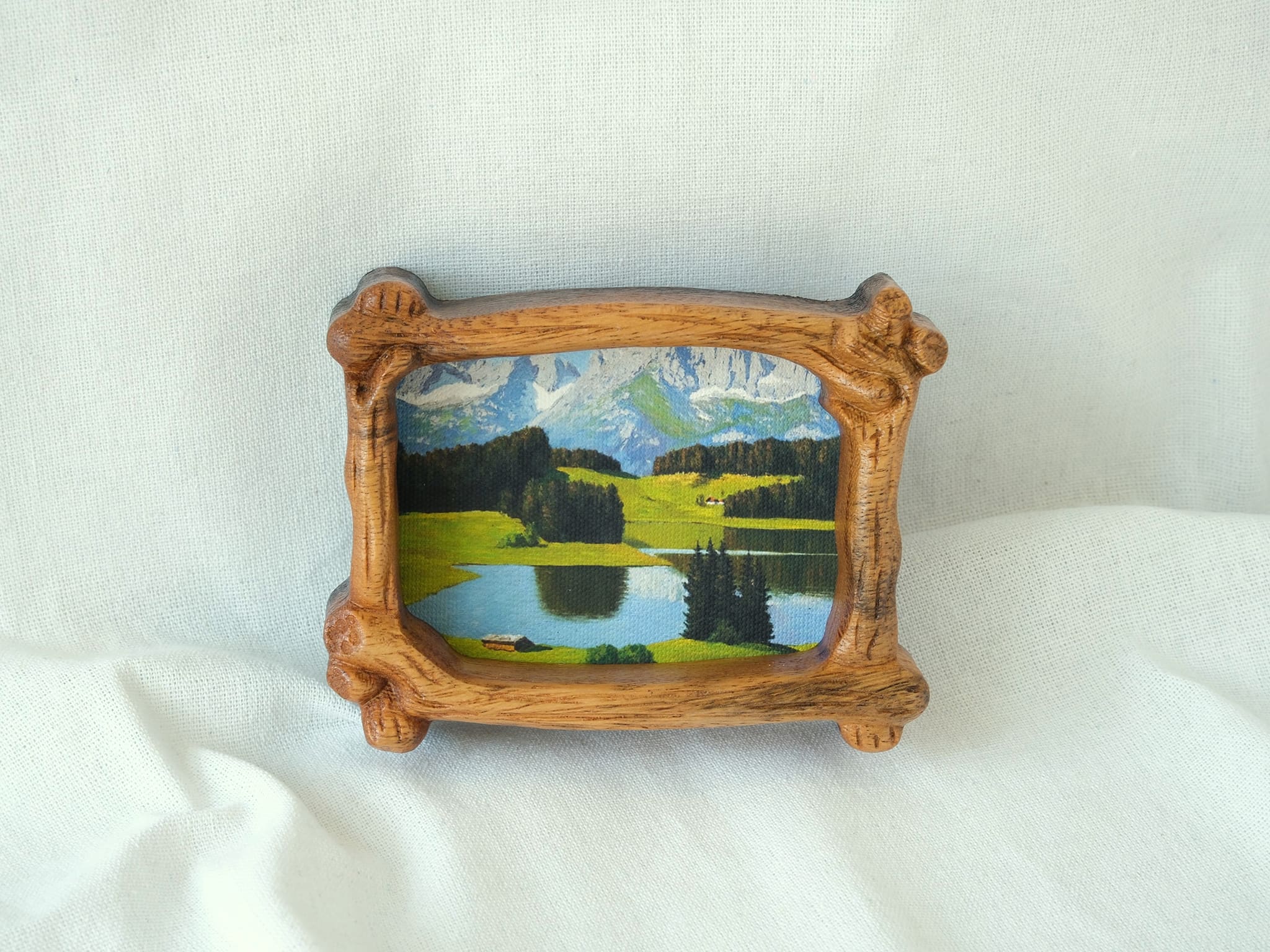 Handmade wooden frame, displayed against the wall.
