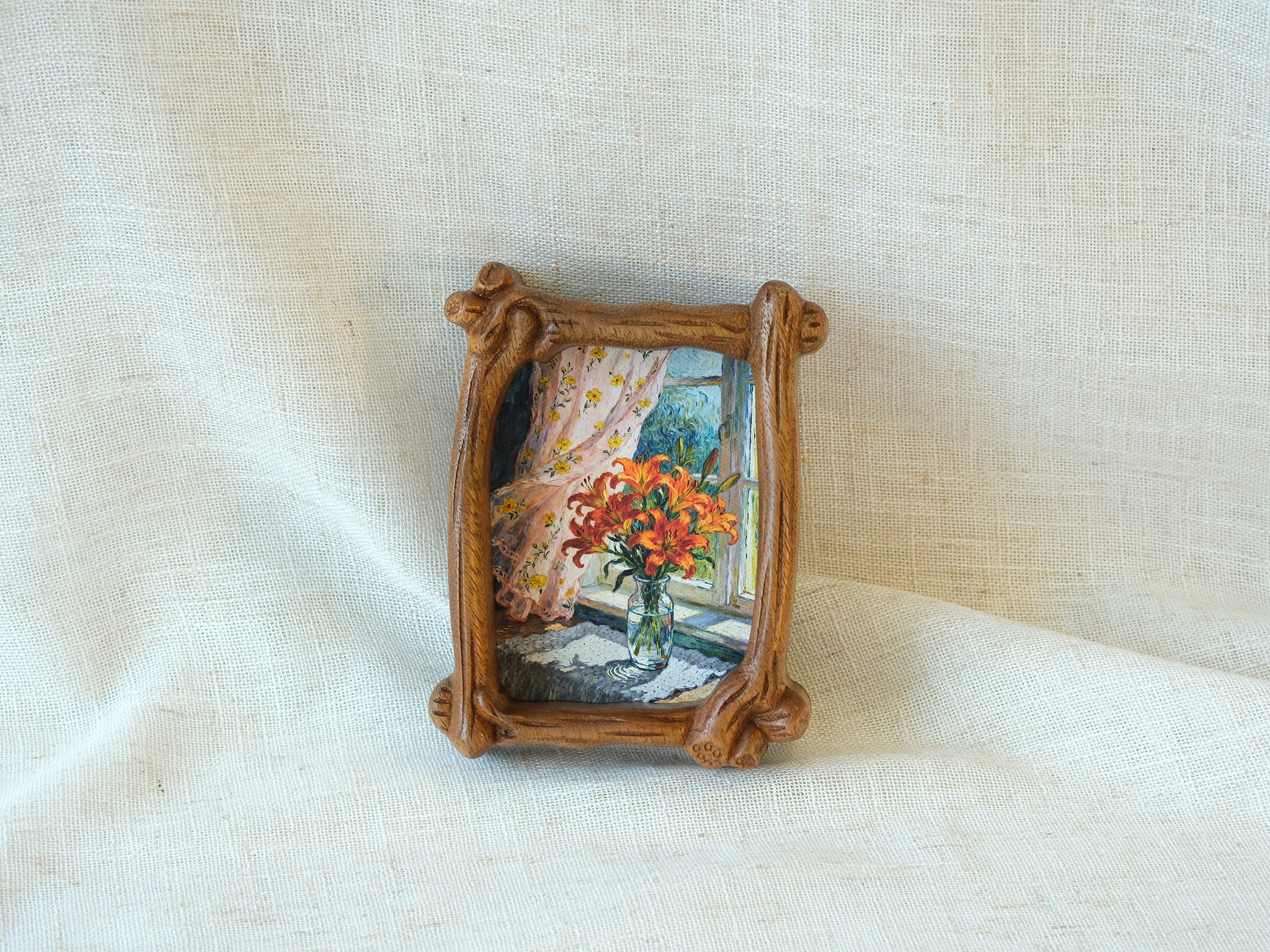 The handcrafted organic solid wood frame standing against a white wall, highlighting its biomorphic branch-like design.