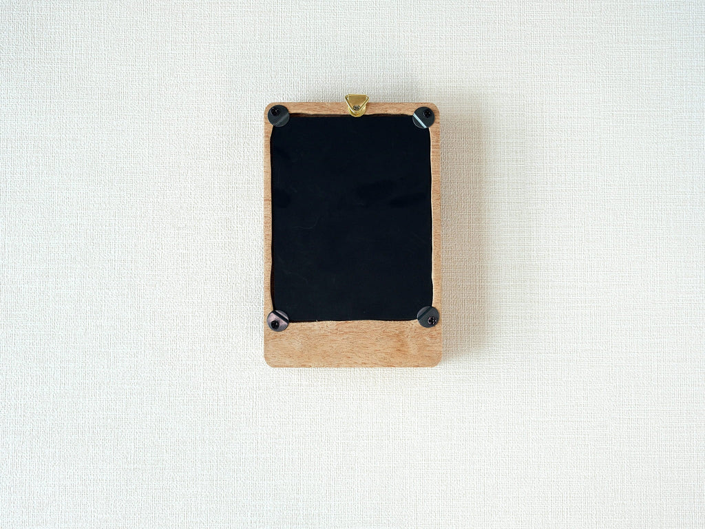 Handmade solid wood wall art picture frame back view with hanging hardware and removable back panel.