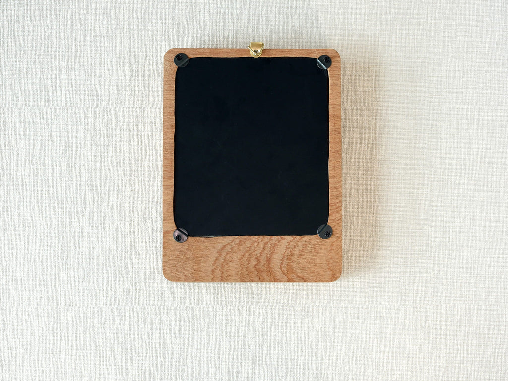 Large handmade solid wood wall art picture frame back view with hanging hardware and removable back panel.
