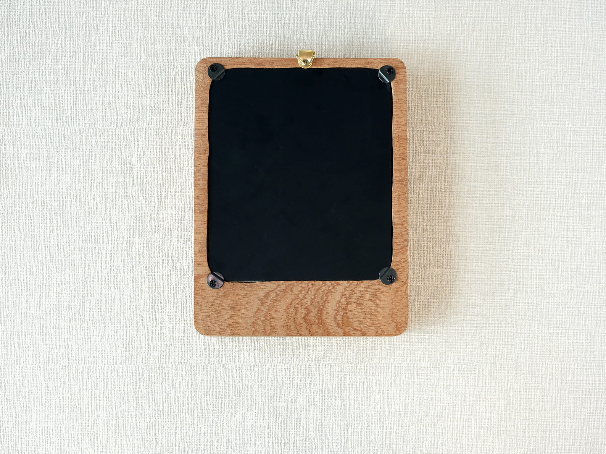 Large handmade solid wood wall art picture frame back view with hanging hardware and removable back panel.