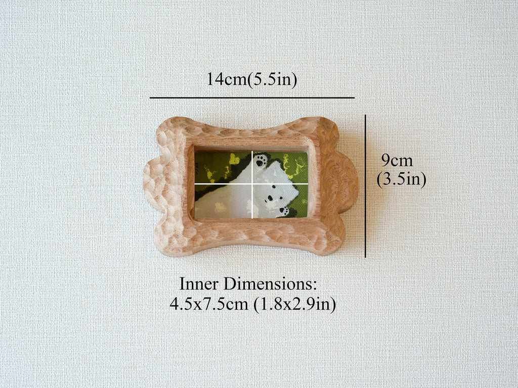 Dimensions for the bone frame: 14x9cm outer size, with a 4.5x7.5cm inner window for precious pet photos.