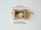 Dimensions for the bone frame: 14x9cm outer size, with a 4.5x7.5cm inner window for precious pet photos.
