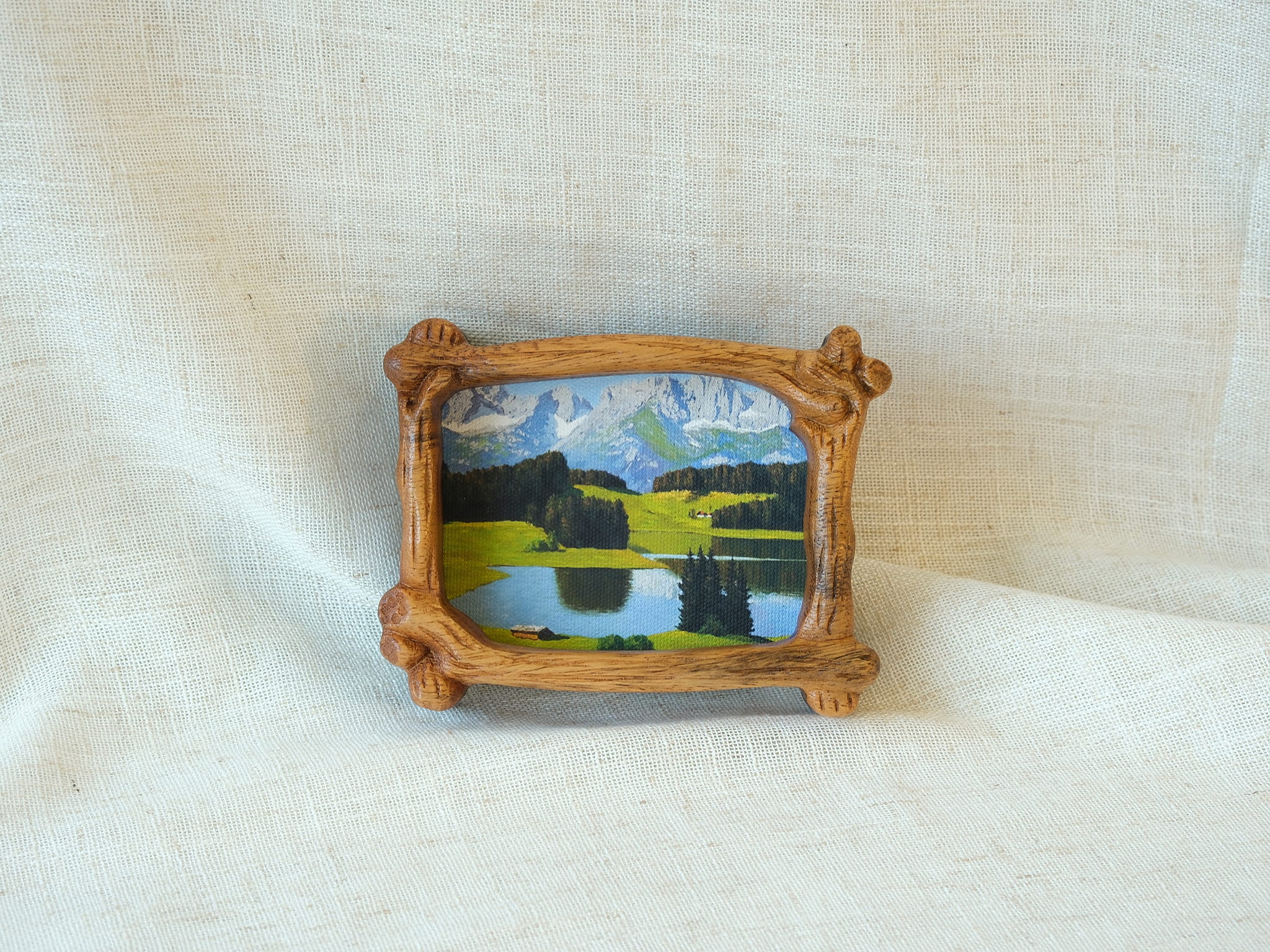 Handmade wooden forest art frame for desktop decor with green tree landscape miniature design.