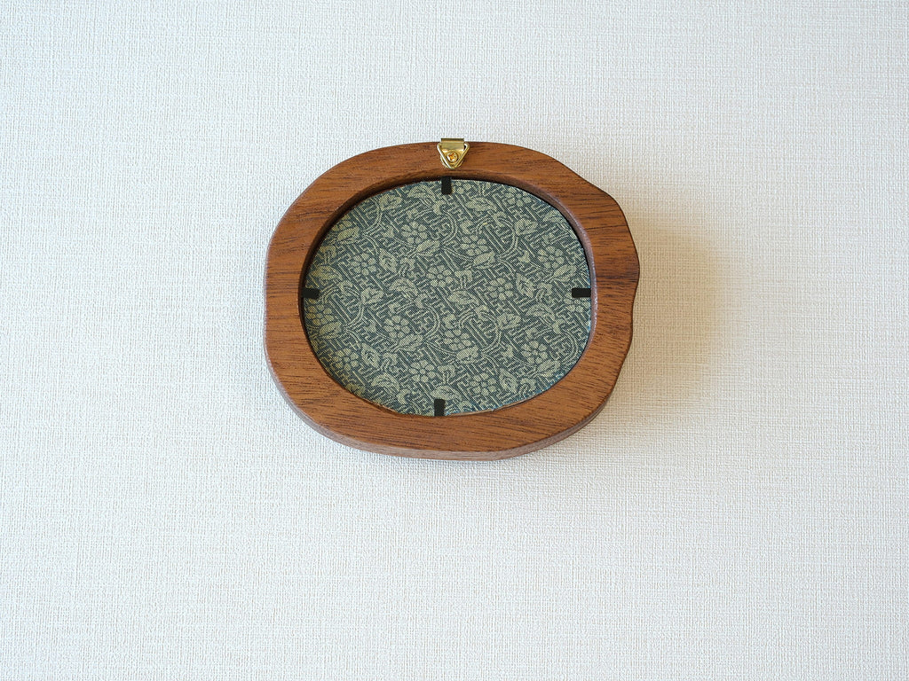 Rear view of the Fomjia wood frame showing the high-quality floral fabric backing, secure metal fasteners, and built-in hanging hardware.