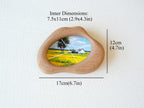 Dimension guide for the cloud wood frame: 17x12cm outer size, with a 7.5x11cm inner window for artwork.