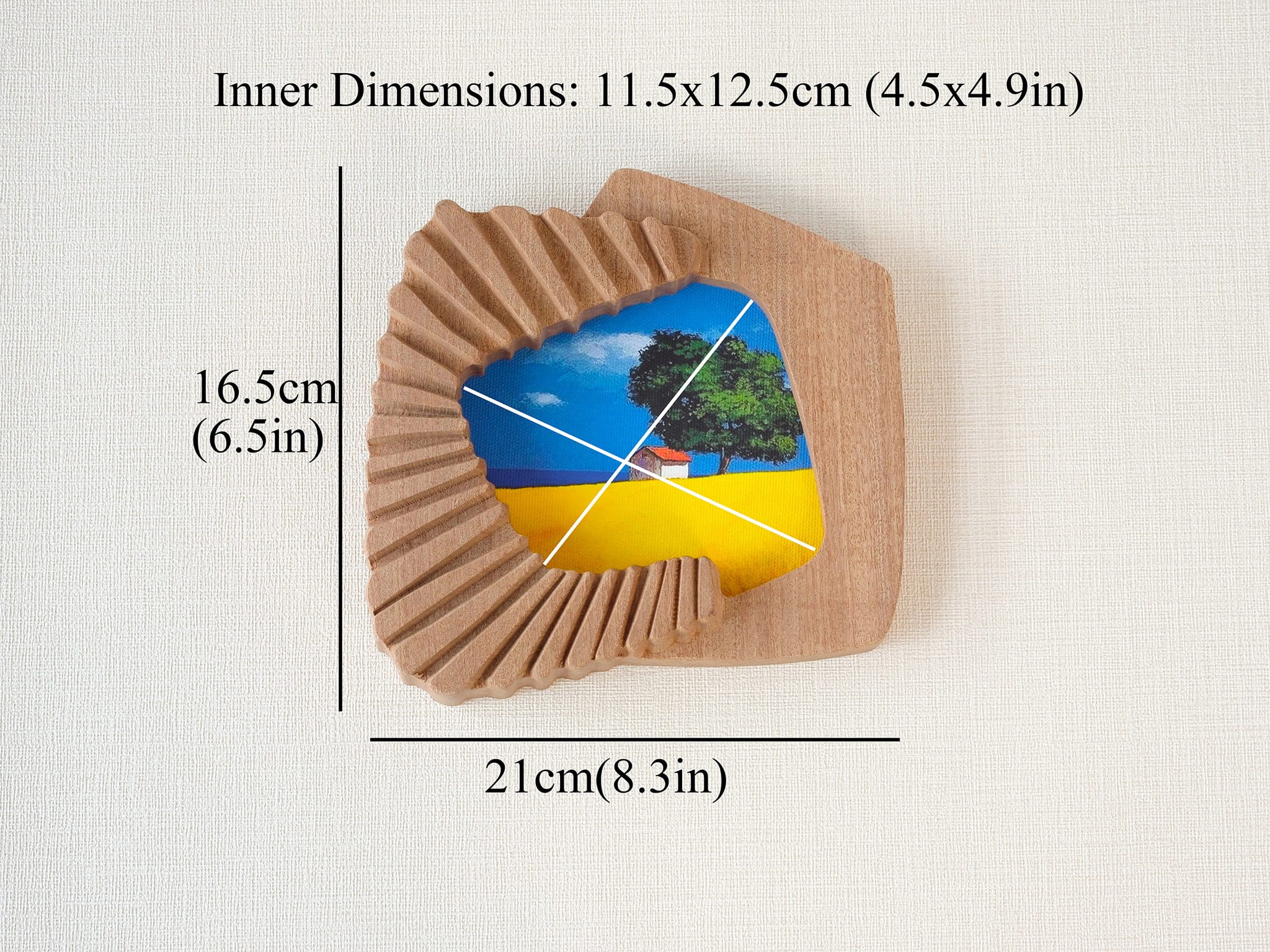Size guide for accordion-inspired solid wood wall art picture frame with outer and inner artwork dimensions.