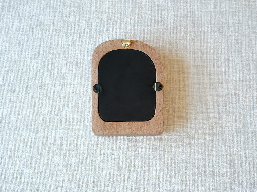 Back view of the soft arched wood frame, showing the integrated wall hook and secure swivel tabs for easy photo setup.