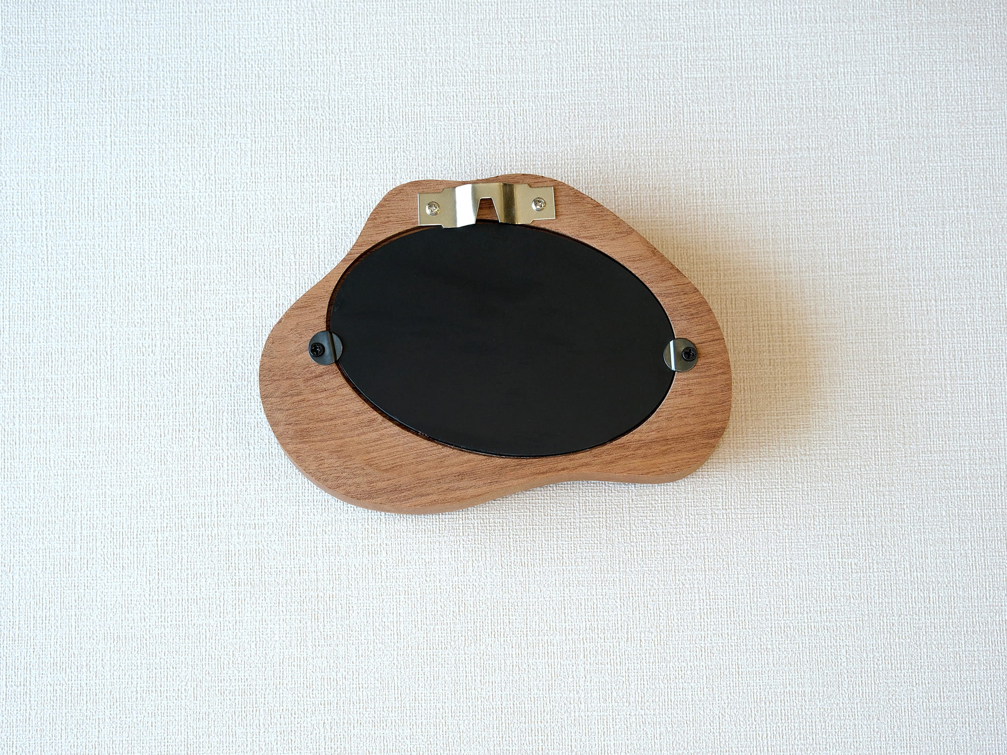 Back view of the cloud wood frame, showing the sturdy wall-mounting hook and secure backing hardware.