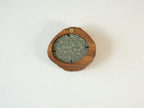 Rear view of the lake-shaped organic solid wood frame, revealing the uniquely patterned blue and gold textile backing and the integrated gold wall hanger.