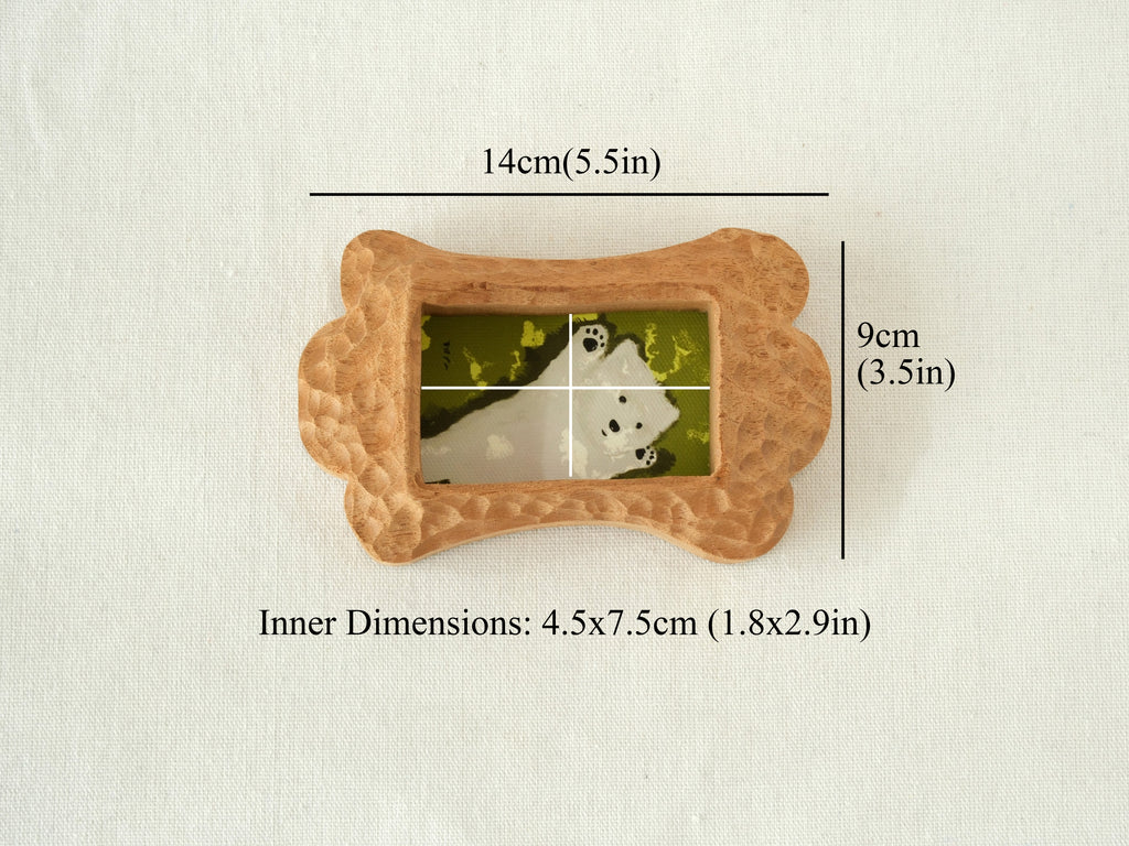 Dimensions for the bone frame: 14x9cm outer size, with a 4.5x7.5cm inner window for precious pet photos.