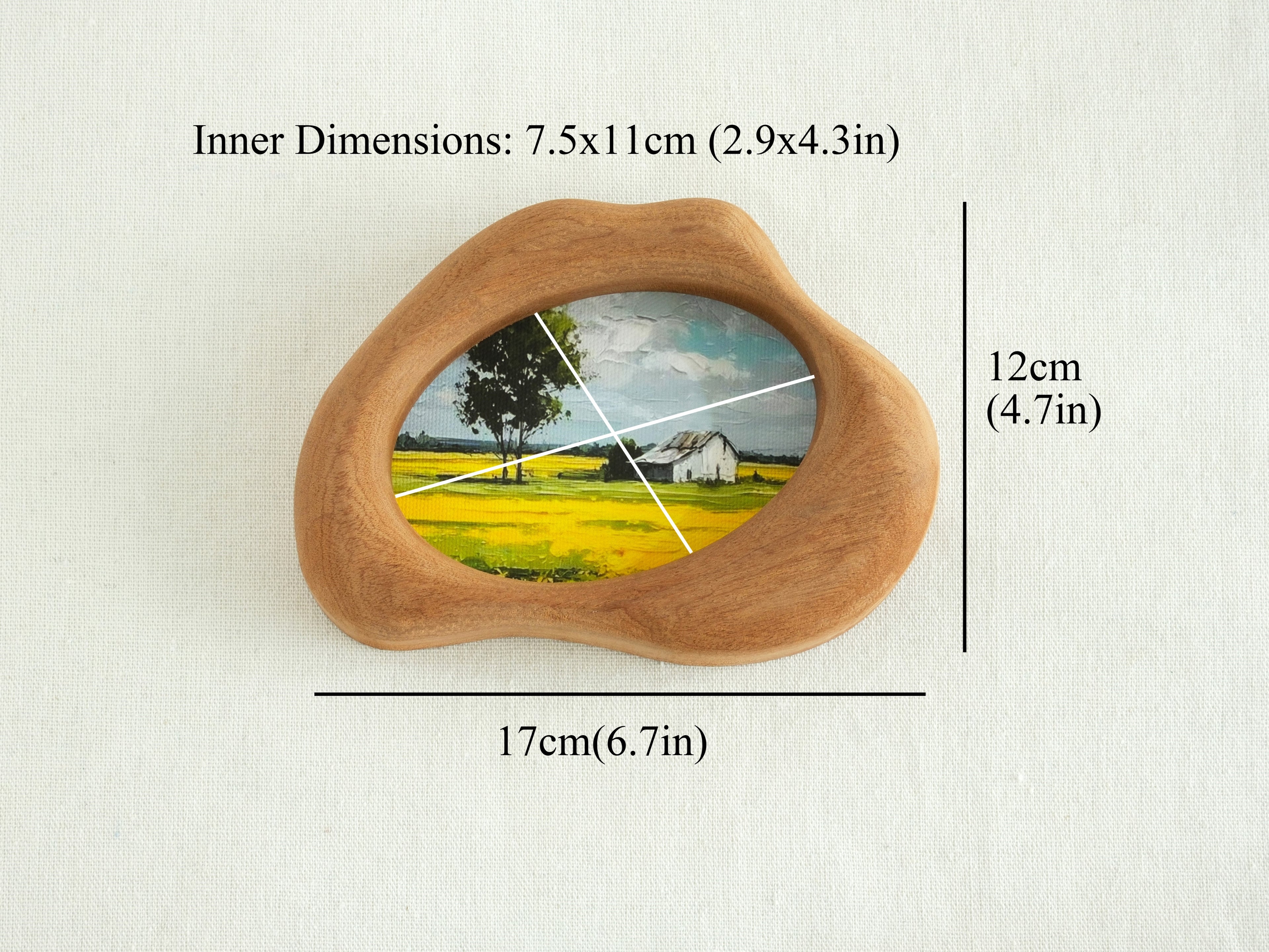 Dimension guide for the cloud wood frame: 17x12cm outer size, with a 7.5x11cm inner window for artwork.