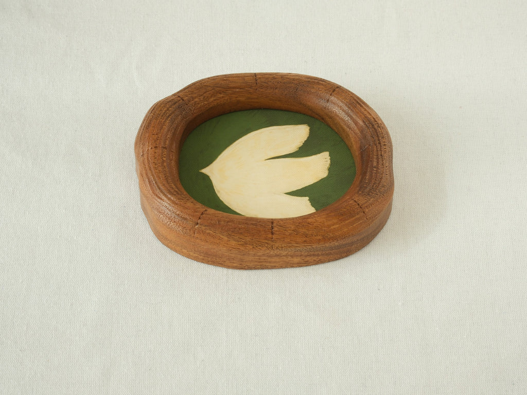 Close-up shot of a unique wood art frame by Fomjia, highlighting the handcrafted joinery, rich natural wood texture, and premium canvas art insert.