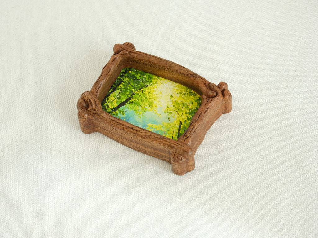 Handmade wooden forest art frame for desktop decor with green tree landscape miniature design.